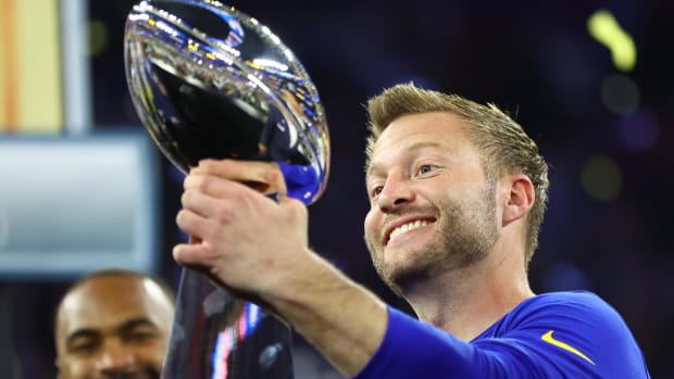 Feb 13, 2022; Inglewood, CA, USA; Los Angeles Rams head coach Sean McVay hoists the Lombardi Trophy after defeating the Cincinnati Bengals in Super Bowl LVI at SoFi Stadium. Mandatory Credit: Mark J. Rebilas-USA TODAY Sports